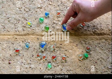 A collection of beads of various colors used in bead play, a traditional Korean game. Stock Photo