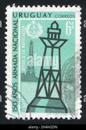 URUGUAY - CIRCA 1968: stamp printed by Uruguay, shows Lighthouse and Buoy, circa 1968 Stock Photo