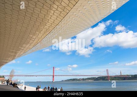 25 April Bridge, former Salazar Bridge, over the Tagus as seen from MAAT, Museum of Art, Architecture and Technology, Lisbon, Portugal Stock Photo