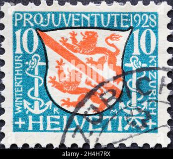 Switzerland - Circa 1928: a postage stamp printed in the Switzerland showing the city arms with two lions in red from Winterthur, city in Switzerland Stock Photo