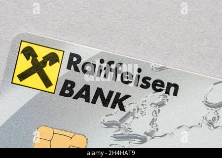 MOSCOW - NOV 01: Logotype of the Raiffeisen bank on a plastic card, top view, in Moscow, November 01. 2021 in Russia. Stock Photo