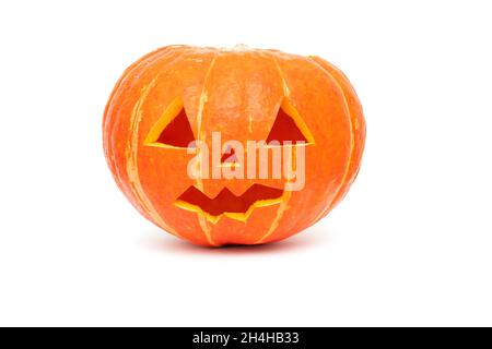 Halloween pumpkin, vibrant orange halloween pumpkin with scary face isolated on white Stock Photo