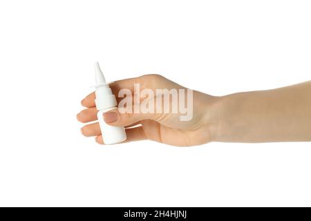 Female hand holds blank bottle of nasal spray, isolated on white background Stock Photo