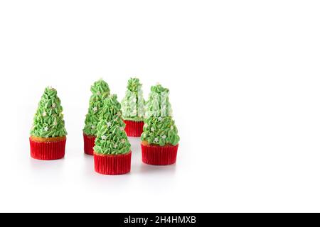 Christmas tree cupcakes isolated on white background Stock Photo