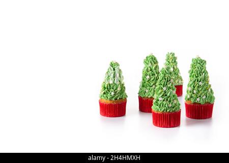 Christmas tree cupcakes isolated on white background Stock Photo