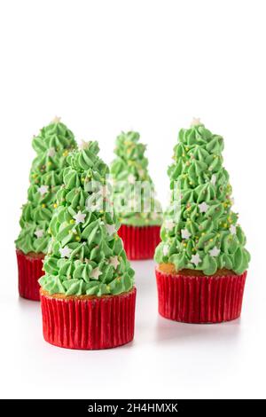 Christmas tree cupcakes isolated on white background Stock Photo