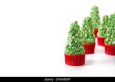 Christmas tree cupcakes isolated on white background Stock Photo