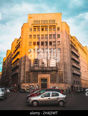 BUCHAREST, ROMANIA - Sep 01, 2021: An old office building against the cloudy sky Stock Photo