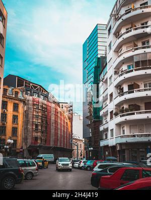 BUCHAREST, ROMANIA - Sep 01, 2021: A vertical shot of old, renovated, and new buildings Stock Photo