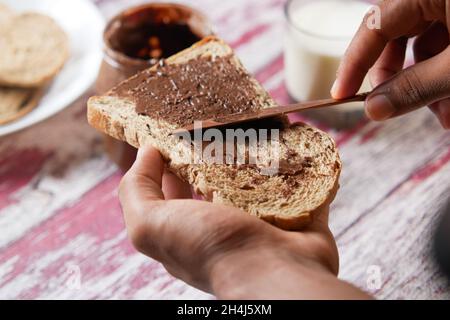 Chocolate cream spread on Toast Stock Photo