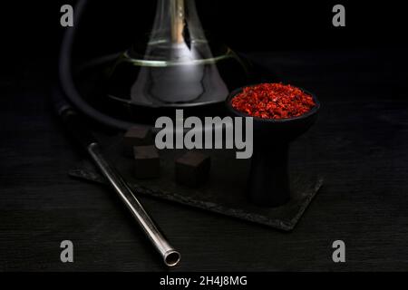 Hookah bowl, with tobacco on dark background Stock Photo
