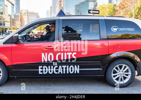 Toronto, Ontario, Canada-October 28, 2019: Car with sign reading 'No Cuts to Education'. Worker's Unions protested the Provincial Conservative Governm Stock Photo