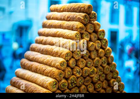 traditional oriental sweets baklava with nuts. Juicy sweetness, Honey baklava. Traditional oriental dessert. Pieces of sweet puff pastry with walnuts. Stock Photo