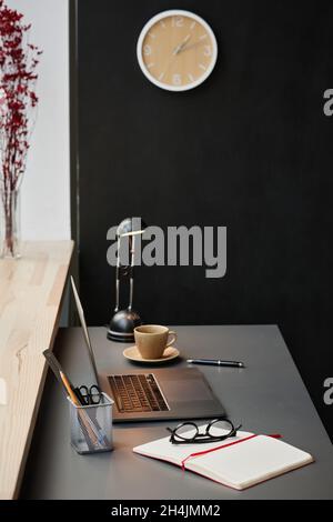 Image of modern workplace with laptop and notebook of business person at office Stock Photo