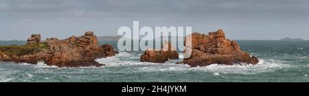 France, Cotes d'Armor, pink granite coast, Perros-Guirec, Ploumanac'h, big spring equinox towards the point of Skewell and the archipelago of seven islands in panoramic view Stock Photo