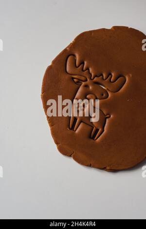 Beautiful deer carved on raw ginger dough Concept of Stock Photo