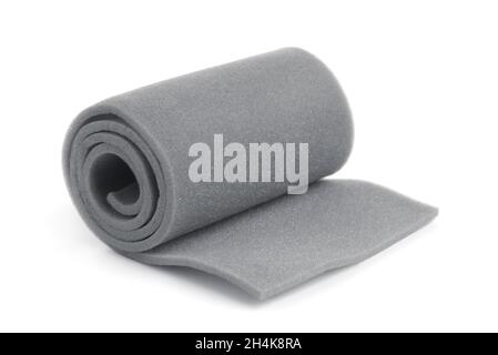 Rolled gray sponge foam sheet isolated in white Stock Photo