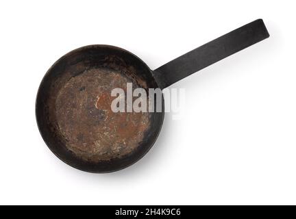 Old, rusty, cast-iron pan for baking cornbread sticks in the shape of corn  on the cob isolated against a white background Stock Photo - Alamy