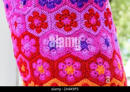 Vivid multi colored background of beautiful knitted threads displayed for sale at a clothing store Stock Photo