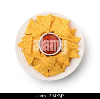 Top view of nacho chips and tomato dip sauce on  plate isolated on white Stock Photo