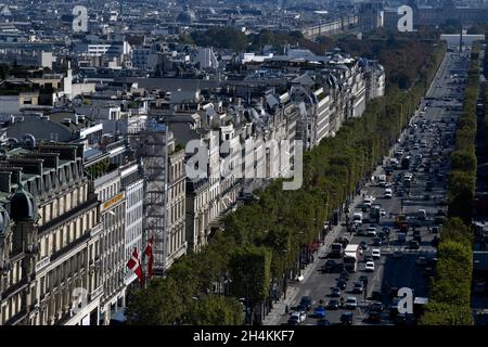 Champs Elysees, main avenue at Paris, seen from the top roof view of the Arc de Triomphe, Paris France.