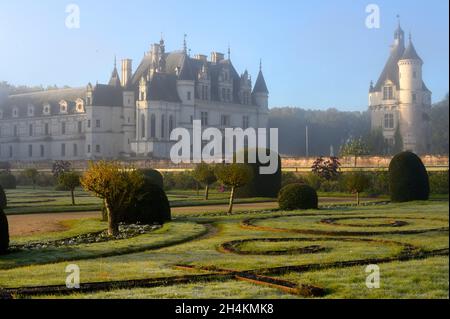 Chenonceaux castle surrounded by early morning fog in the Loire Valley, France, Europe.