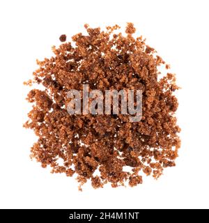 Muscovado sugar isolated on white background. Barbados sugar, khandsari or khand. Top view. Stock Photo