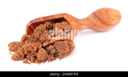 Dark muscovado sugar or Barbados sugar in wooden spoon isolated on white  background Stock Photo - Alamy