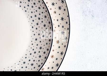 Minimalistic table setting for Christmas dinner on white concrete table Stock Photo