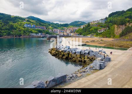 View from the docks of the bay and the town of Mutrico in the background. Gipuzkoa, Eskadi, Spain Stock Photo