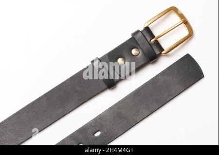 Black leather with metal buckle belt isolated on white background Stock Photo