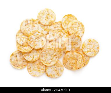 Round crunchy crispbreads isolated on a white background. Round shaped cereal bread, healthy food without yeast. Puffed multigrain crispbreads for die Stock Photo