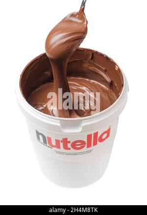 Moscow, Russia - 23 June, 2020: Bucket of Nutella. Spoon in chocolate cream, dessert. Stock Photo