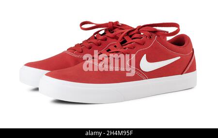 Moscow, Russia - October 29, 2020: NIKE red skaters sneakers isolated on white background Stock Photo