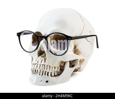 Human skull with glasses isolated on a white background Stock Photo