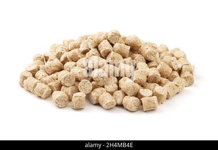 Heap of extruded rye bran isolated on a white background Stock Photo