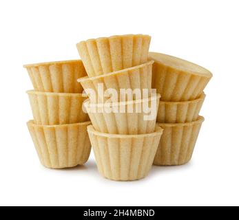 Stack of empty tart shells isolated on white background Stock Photo