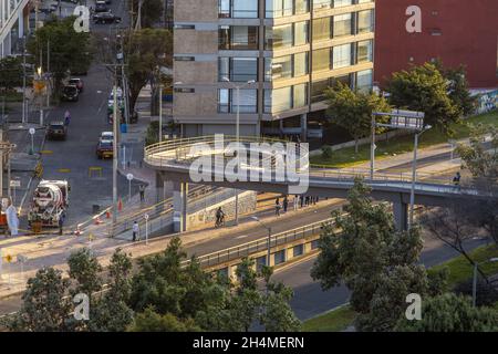 BOGOTA, COLOMBIA - Feb 02, 2021: The people in a pedestrian crossing.  Bogota, Colombia Stock Photo