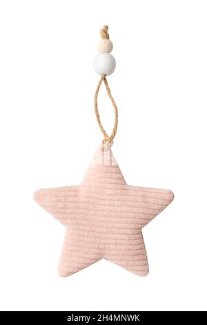 Christmas tree toy made of pink velvet fabric in the star shape isolated on a white background. Decor element, decoration for the New Year. Stock Photo