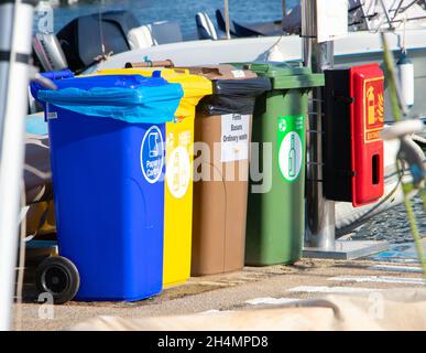 recycling trash bins for paper glass bottles plastic in harbour Palma Mallorca Stock Photo