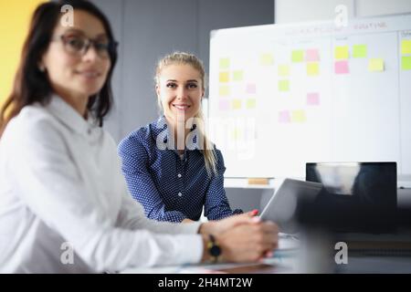 Smiling female on working place Stock Photo