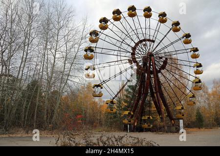 Ferris Wheel at Pripyat abandoned amusement park in Ukraine Stock Photo