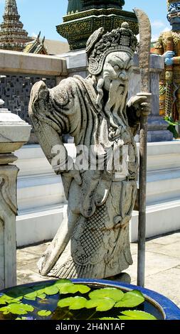 Warrior statue at Wat Pho temple, Grand Palace. Bangkok, Thailand Stock Photo