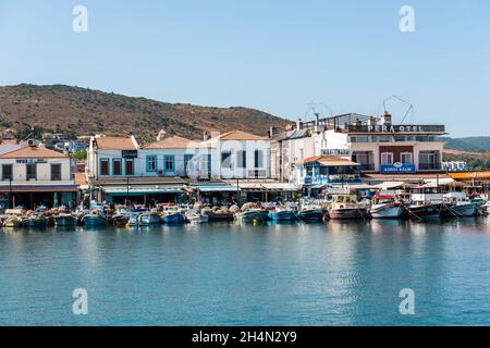 Urla, Izmir, Turkey – October 3, 2020. Waterfront in Urla town of Izmir province in Turkey. View with boats and commercial properties. Stock Photo