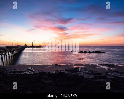 Pre-dawn glow over the Port of Broome, Kimberley, Western Australia Stock Photo