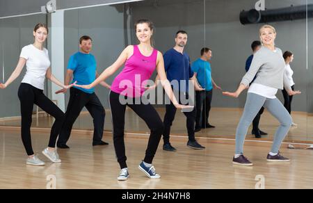 People practicing vigorous dance Stock Photo