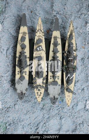 The lineup of miniature battleships consists of the enterprise carrier, the submarine, the battleship Musashi, the battleship Yamato, the main battles Stock Photo