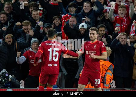 Liverpool. 3rd Nov, 2021. Liverpool's Diogo Jota (R) celebrates scoring with a teammate during the UEFA Champions League Group B match between Liverpool and Atletico Madrid in Liverpool, Britain, on Nov. 3, 2021. Liverpool won 2-0. Credit: Xinhua/Alamy Live News Stock Photo