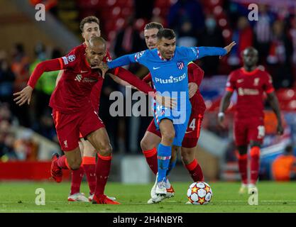 Liverpool. 3rd Nov, 2021. Liverpool's Fabinho (Front, L) vies with Atletico Madrid's Angel Correa (Front, R) during the UEFA Champions League Group B match between Liverpool and Atletico Madrid in Liverpool, Britain, on Nov. 3, 2021. Liverpool won 2-0. Credit: Xinhua/Alamy Live News Stock Photo