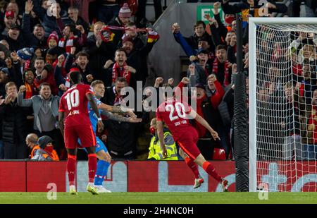 Liverpool. 3rd Nov, 2021. Liverpool's Diogo Jota (R) celebrates scoring during the UEFA Champions League Group B match between Liverpool and Atletico Madrid in Liverpool, Britain, on Nov. 3, 2021. Liverpool won 2-0. Credit: Xinhua/Alamy Live News Stock Photo